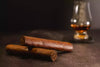 Cigars with bourbon in the back