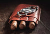 Cigars in a leather container