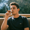 young man smoking cigar