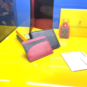 The OpusX Society Red and Black Passport Holder