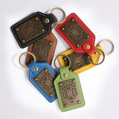 The OpusX Society Green Leather Keychain with all other colors on display front