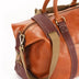 The OpusX Society Italian Leather Duffle Bag Camel and Burgundy Shoulder Guard