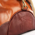 The OpusX Society Italian Leather Duffle Bag Camel and Burgundy Side View