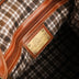 The OpusX Society Italian Leather Duffle Bag Camel Inside plate Logo