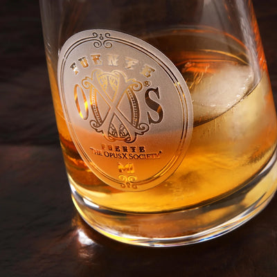 The OpusX Society Whiskey Rocks Glass with Whiskey on the Rocks