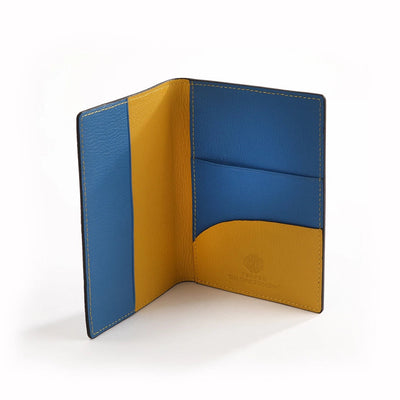 The OpusX Society Yellow and Blue Passport Holder Open