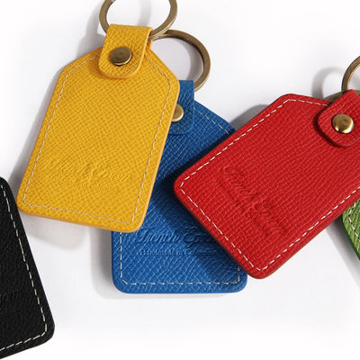 The OpusX Society Yellow Leather Keychain