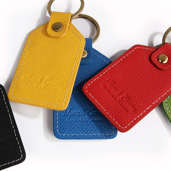 The OpusX Society Yellow Leather Keychain