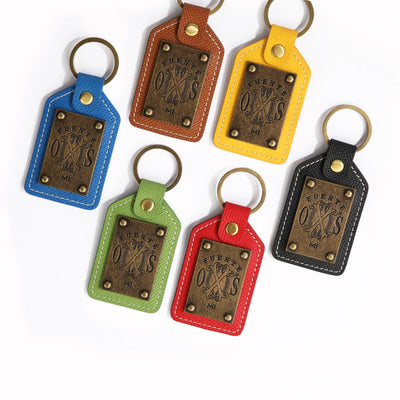 The OpusX Society Yellow Leather Keychain